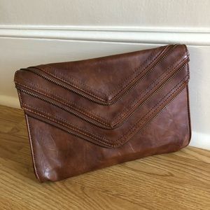 Brown leather clutch